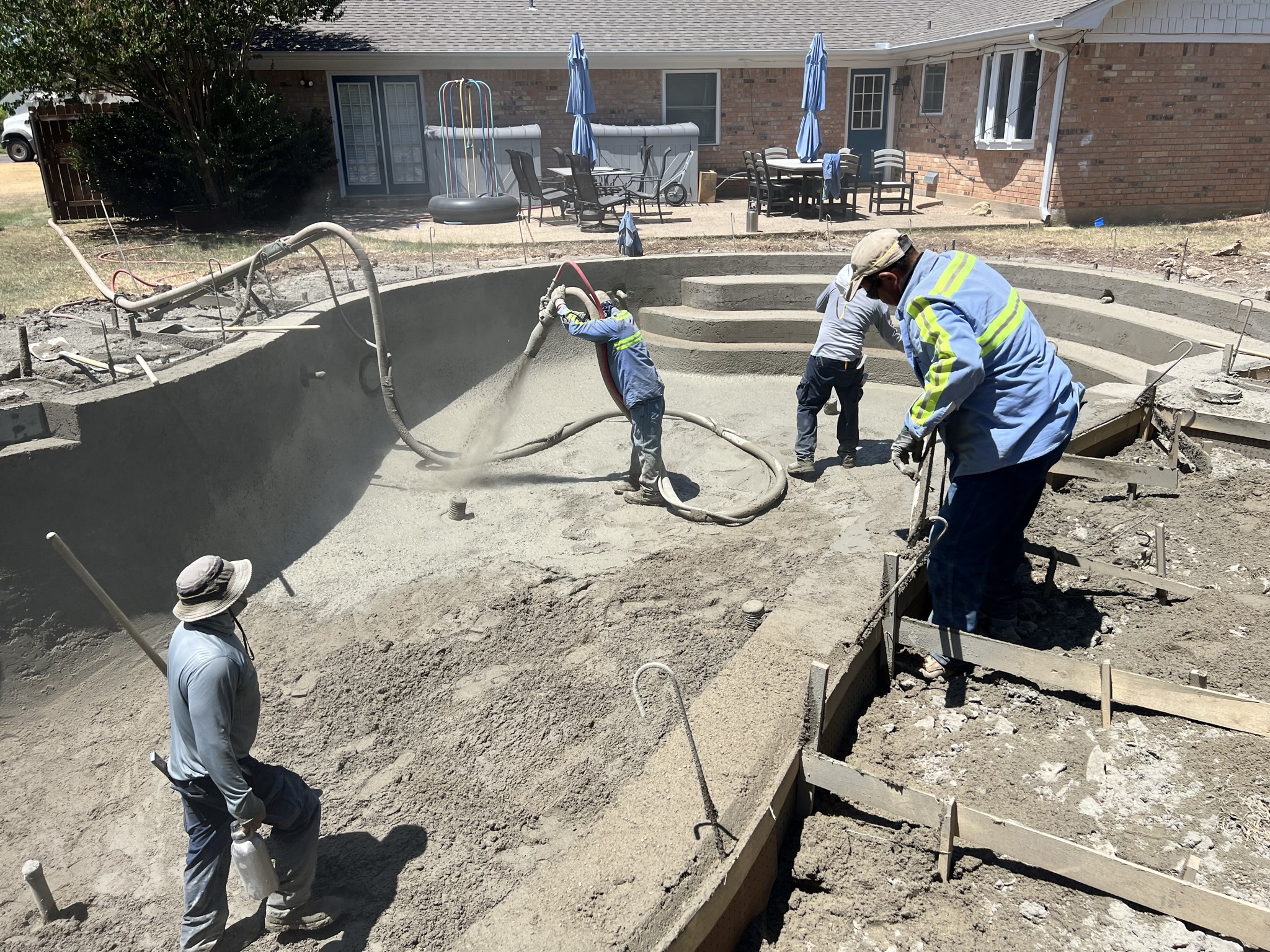 Gunite application during pool construction